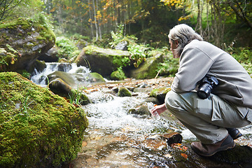 Image showing man drinking fresh water from spring