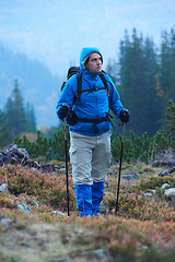 Image showing advanture man with backpack hiking