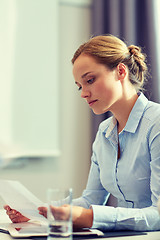 Image showing businesswoman having problem in office