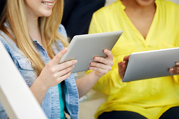 Image showing close up of students with tablet pc at school