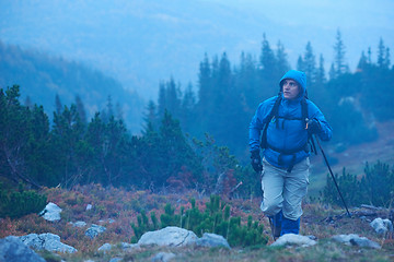 Image showing advanture man with backpack hiking