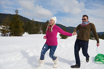 Image showing happy young couple having fun on fresh show on winter vacation