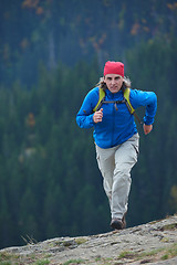 Image showing advanture man with backpack hiking