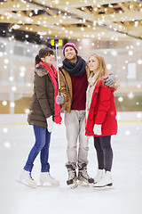 Image showing happy friends taking selfie on skating rink