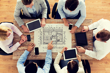 Image showing business team or architects with blueprint