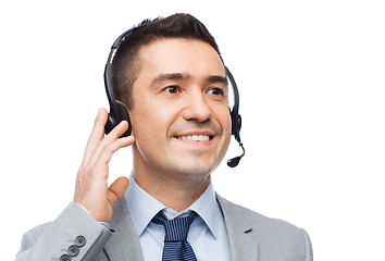 Image showing smiling businessman in headset