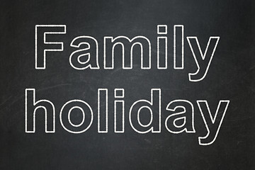 Image showing Tourism concept: Family Holiday on chalkboard background