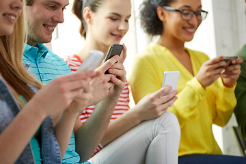 Image showing close up of students with smartphones at school