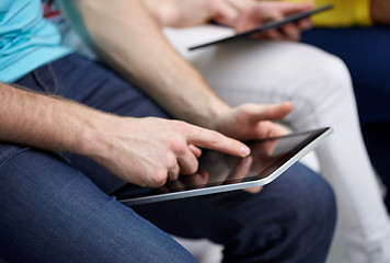 Image showing close up of student hands with tablet pc at school