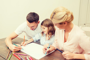 Image showing happy family drawing at home