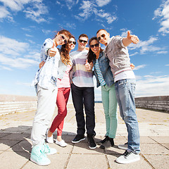 Image showing teenagers showing thumbs up