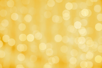 Image showing blurred golden background with bokeh lights