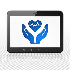 Image showing Insurance concept: Tablet Computer with Heart And Palm on display