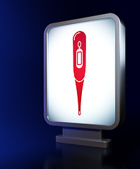 Image showing Medicine concept: Thermometer on billboard background