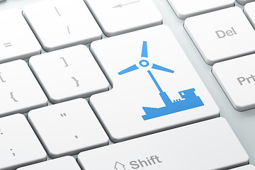 Image showing Manufacuring concept: Windmill on computer keyboard background