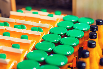 Image showing jars and bottles with eco food at bio market