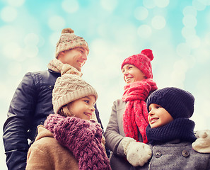 Image showing happy family in winter clothes outdoors