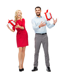 Image showing happy couple with gift boxes
