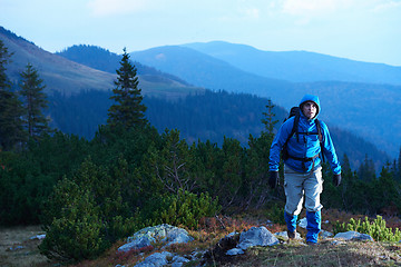 Image showing advanture man with backpack hiking