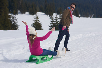 Image showing happy young couple having fun on fresh show on winter vacation