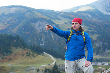 Image showing advanture man with backpack hiking