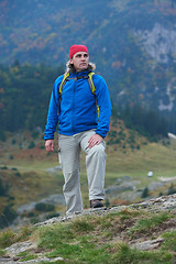 Image showing advanture man with backpack hiking