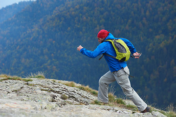 Image showing advanture man with backpack hiking