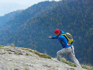 Image showing advanture man with backpack hiking