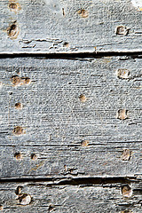 Image showing metal nail dirty stripped paint in the brown  