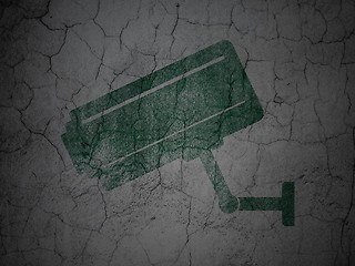 Image showing Safety concept: Cctv Camera on grunge wall background