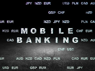 Image showing Currency concept: Mobile Banking in grunge dark room