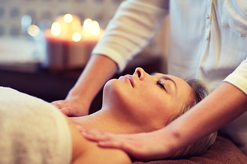 Image showing close up of woman lying and having massage in spa