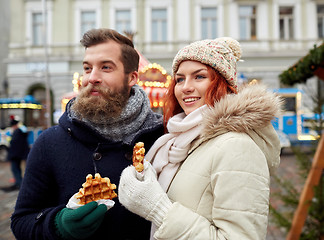 Image showing happy couple walking in old town