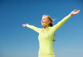 Image showing woman doing sports outdoors