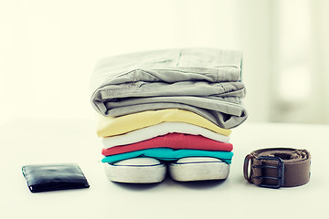 Image showing close up of clothes and accessories on table