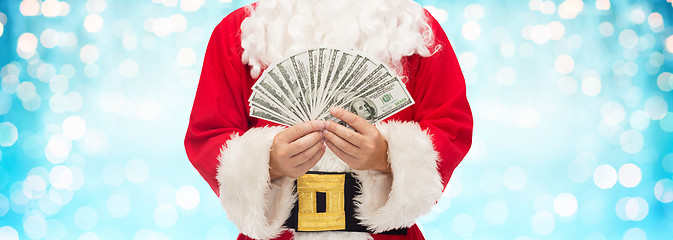 Image showing close up of santa claus with dollar money