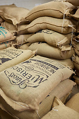 Image showing stack of burlap sacks with coffee beans