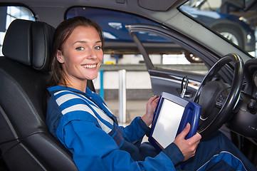 Image showing Updating the board computer of a car