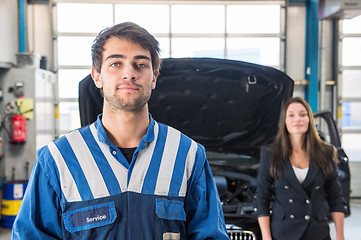 Image showing Portrait of a confident mechanic in a garage