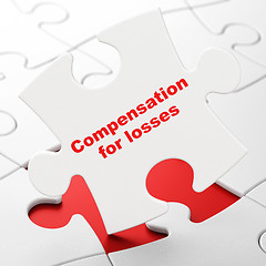 Image showing Banking concept: Compensation For losses on puzzle background