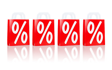 Image showing many red shopping bags with percentage sign