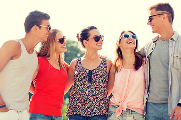 Image showing group of smiling friends in city