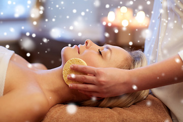 Image showing close up of woman having face massage in spa salon