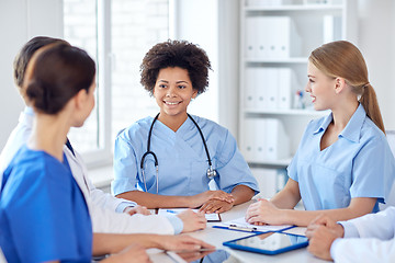 Image showing group of happy doctors meeting at hospital office