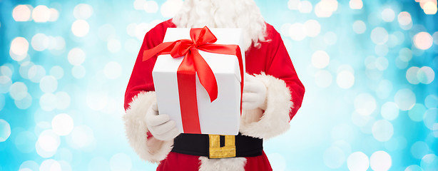 Image showing close up of santa claus with gift box