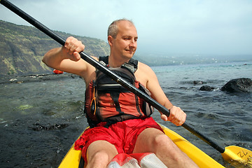 Image showing Man kayaking