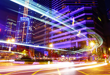 Image showing Fast moving car trail in city at night