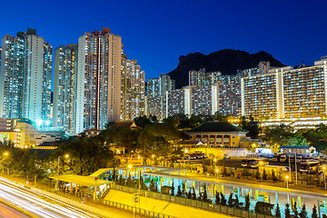 Image showing Cityscape in Hong Kong with lion rock mountain