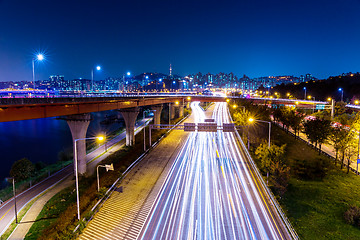 Image showing Light trails from vehicles on motorway at night seoul