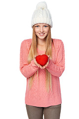 Image showing Smiling female showing heart shape